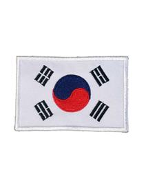 Toppa con emblema Korea